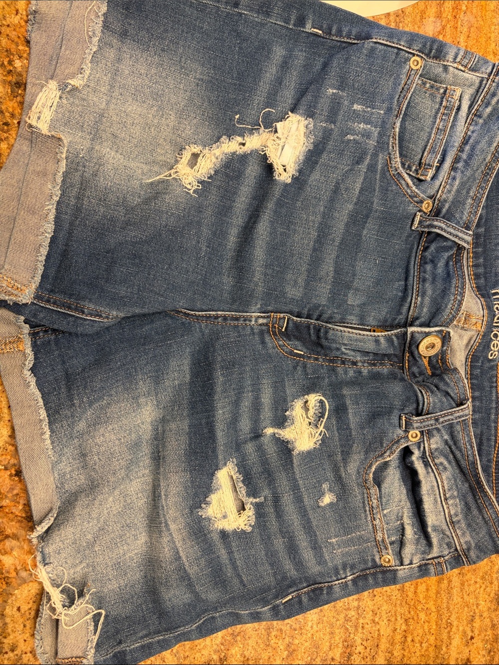Maurices Distressed Denim Cutoff Shorts in Medium Blue